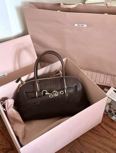 clean stitching and structured luxury inspired bag