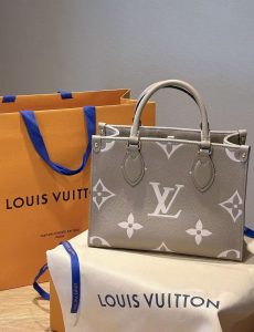 minimal luxury outfit with designer bag