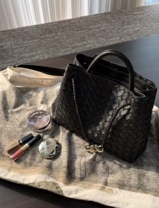 minimal luxury fashion with leather bag