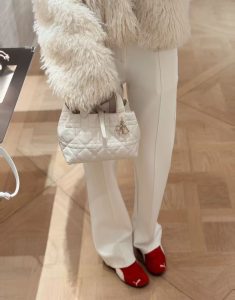 minimalist luxury handbag outfit